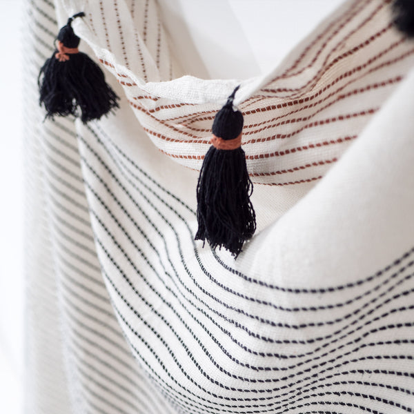 Embroidered Tassel Throw / Blanket - Neutral Fabric Close-up Image